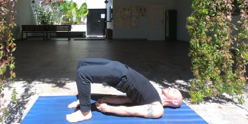 Bridge Pose Setu Bandha Sarvangasana Being performed by Yoga Teacher/ Trainer Jai Salsbery at the Vallarta Breeze Yoga Puerto Vallarta Yoga Studio.