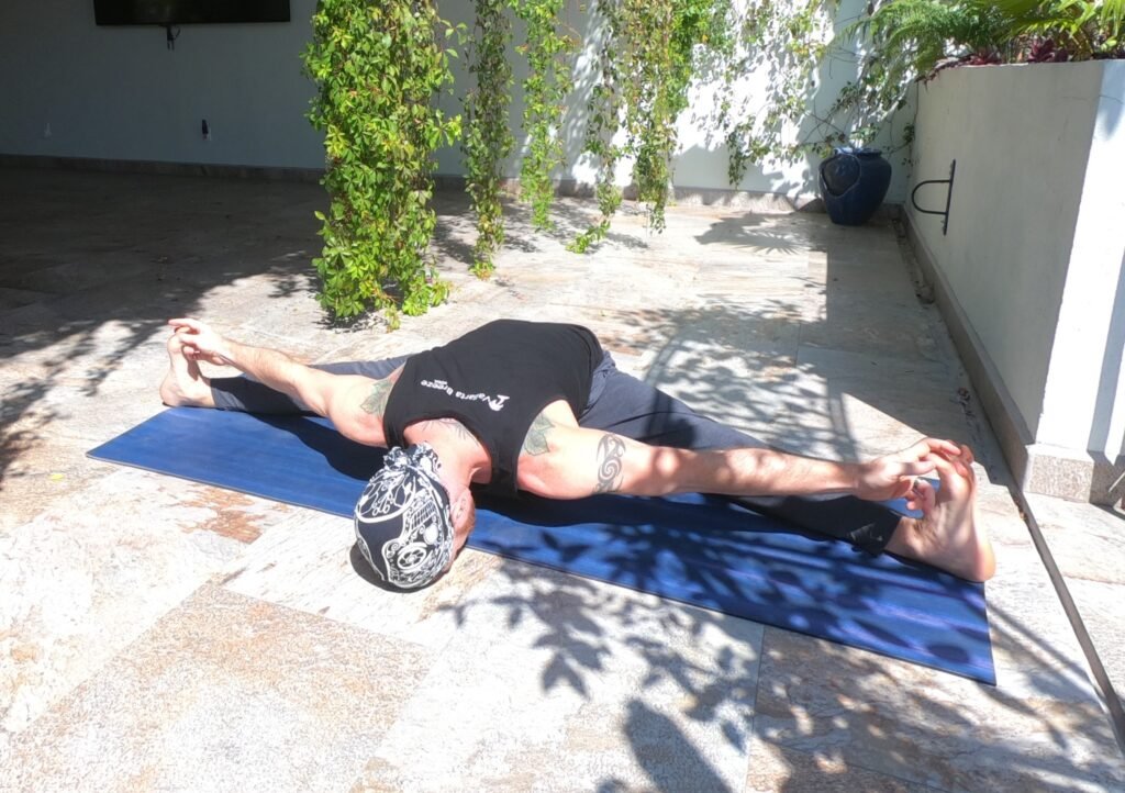Wide Seated Forward Bend with Toes aka Upavistha Konasana aka Pancake Performed by Jai Salsbery at the Vallarta Breeze Yoga Puerto Vallarta Yoga Studio